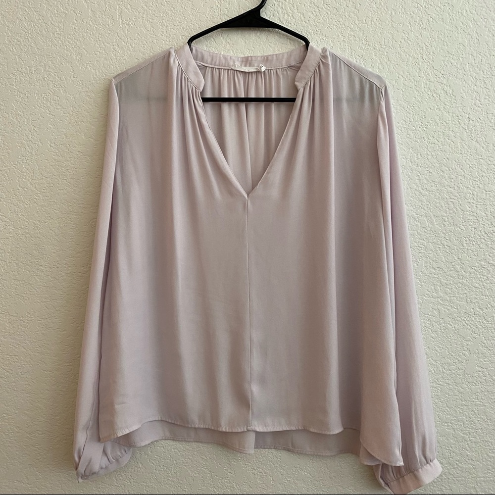 LUSH branded light pink top